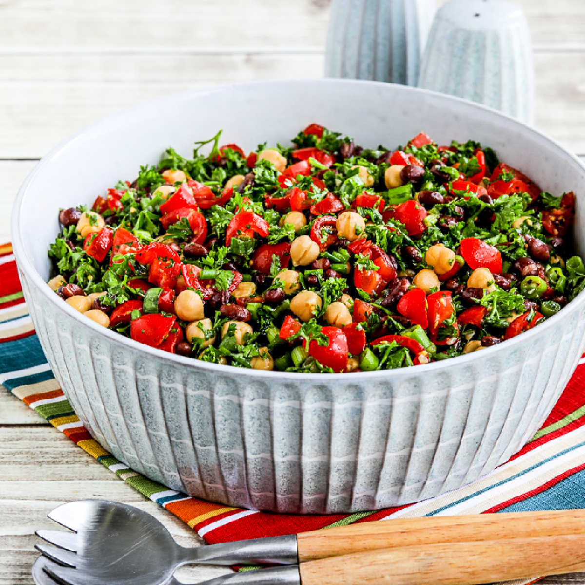 Middle Eastern Bean Salad shown in serving bowl.