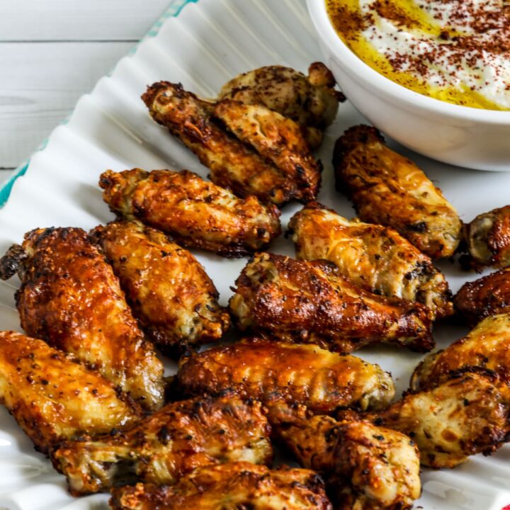 Greek Air Fryer Chicken Wings shown on serving platter with Feta dip