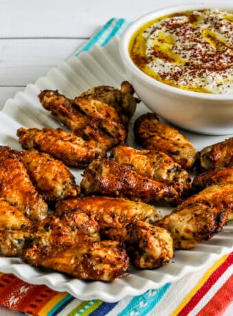 square image of Greek Air Fryer Chicken Wings on platter
