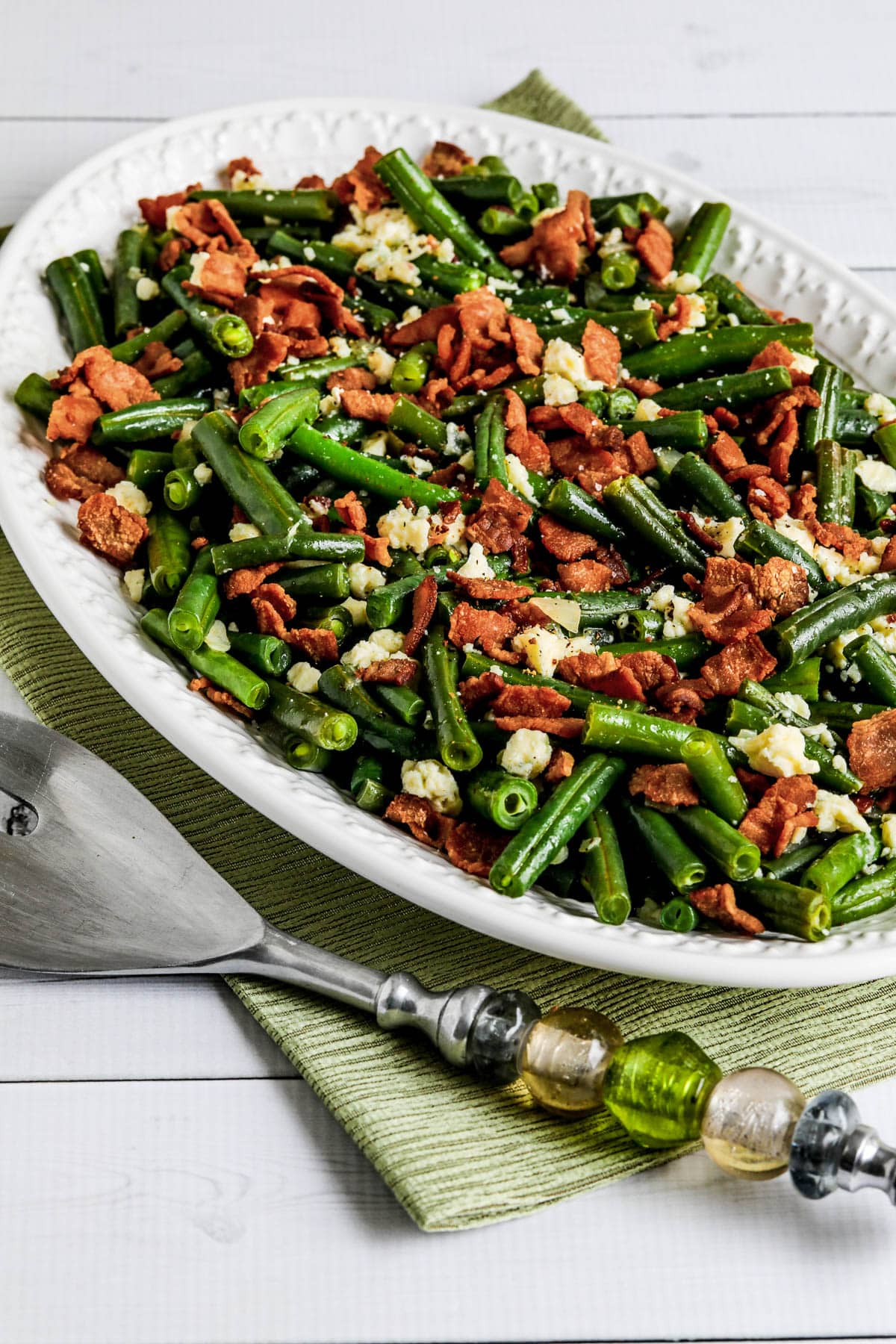 Instant pot green beans with bacon and gorgonzola indicated on serving plate