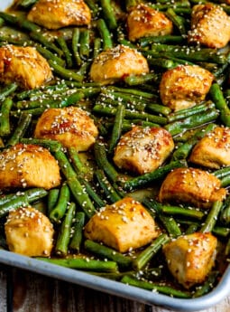 Square image of Asian Chicken and Green Beans Sheet Pan Meal shown on sheet pan.