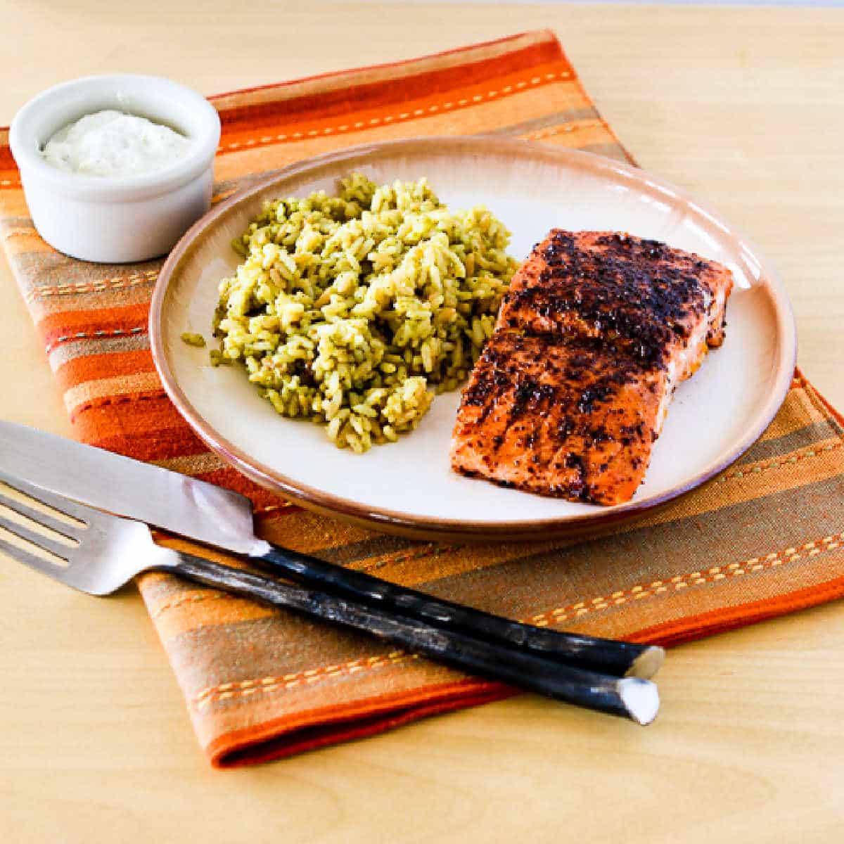 Square image of Salmon Roasted in Olive Oil shown on serving plate.