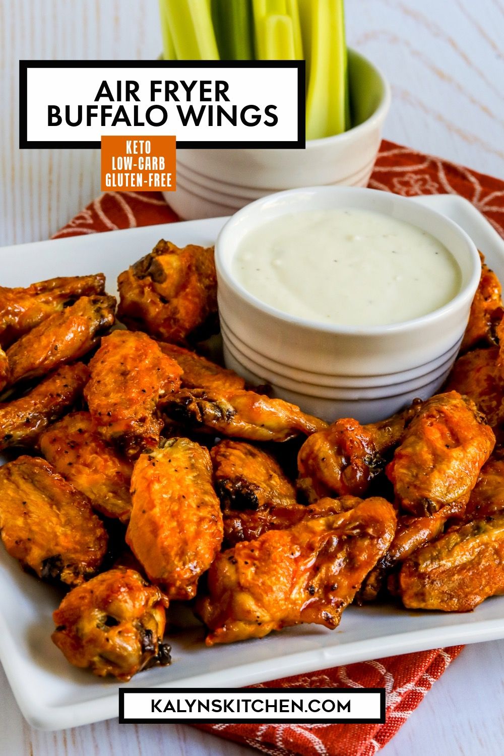 Pinterest image for Air Fryer Buffalo Wings showing wings on serving plate with dip and celery.