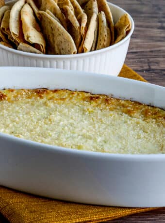 Square image for Hot Artichoke Dip with Peperoncini shown with low-carb pita bread.