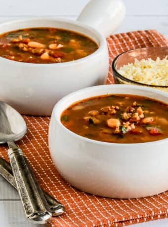 Square image for Cannellini Bean and Sausage Soup in two bowls.