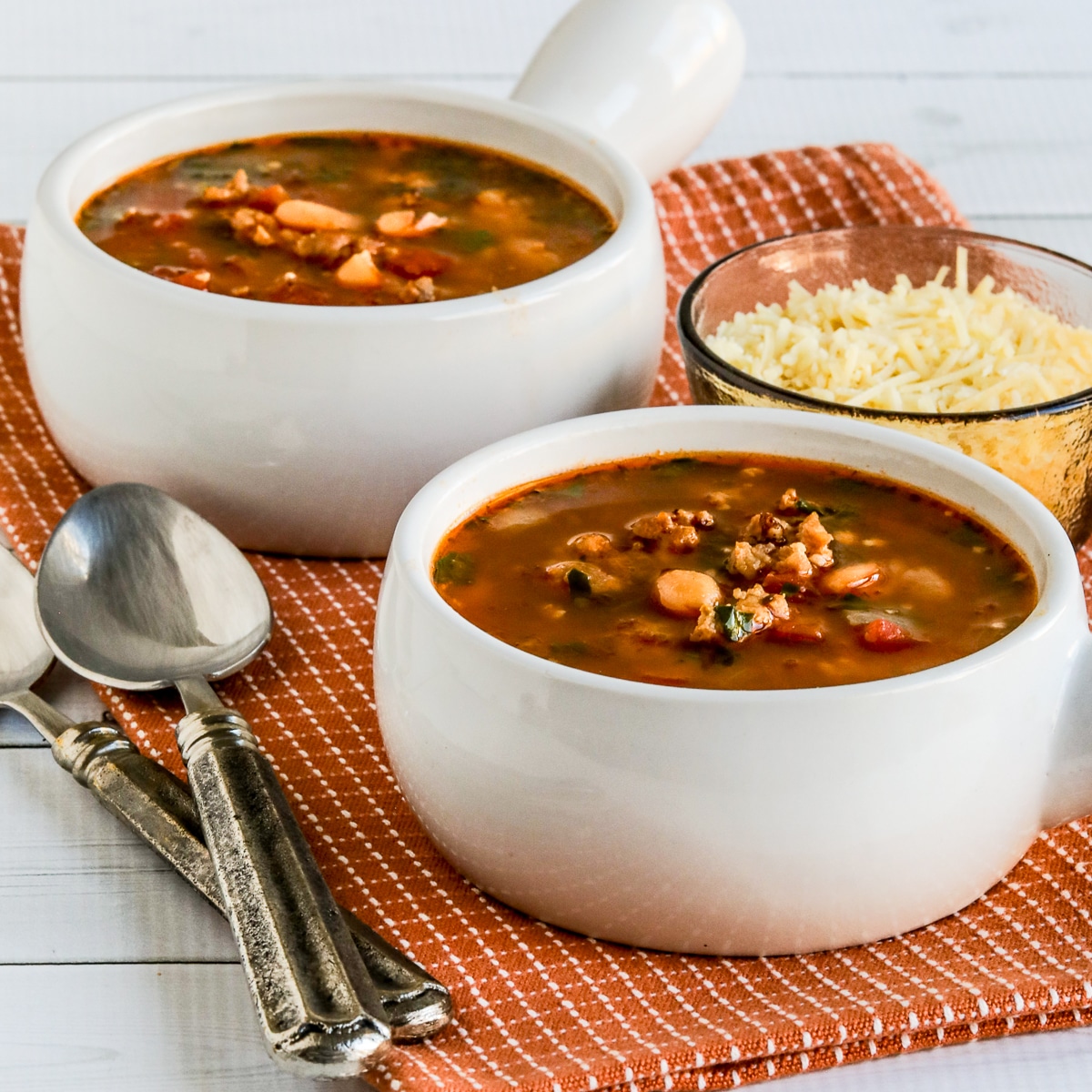 Square image for Cannellini Bean and Sausage Soup in two bowls.