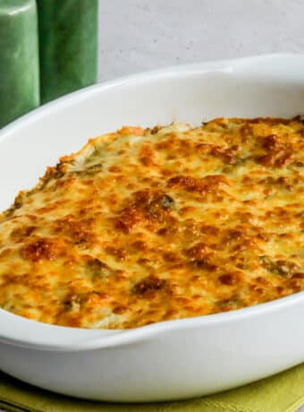 Square image for Cabbage Gratin shown in baking dish with salt-pepper shakers.