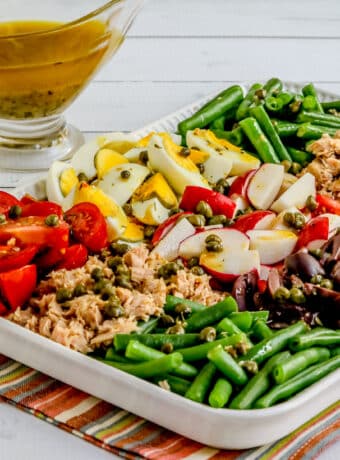 Square image for Nicoise Tuna Salad shown on platter.