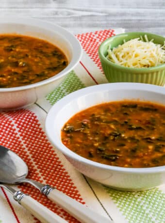 Tomato Spinach Soup in two bowls, square image.