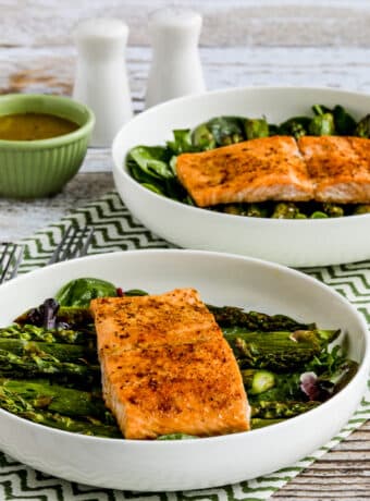 Square image for Salmon and Asparagus Salad shown in two serving bowls.