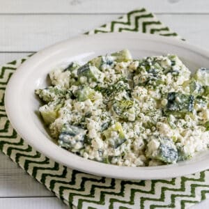 Square featured image for Cottage Cheese Cucumber Salad in serving bowl.