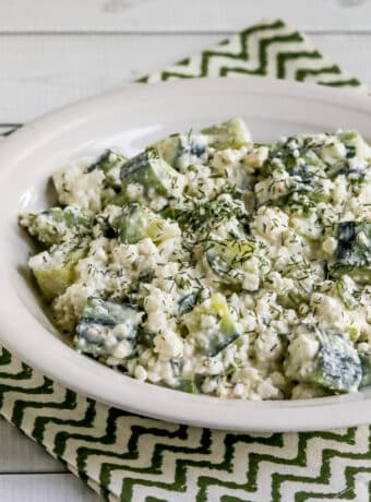 Square featured image for Cottage Cheese Cucumber Salad in serving bowl.