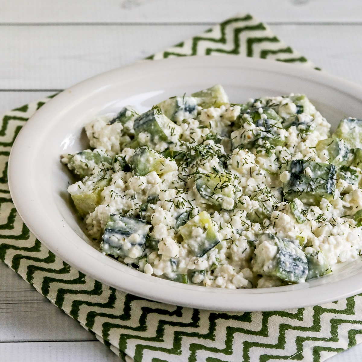 Cottage Cheese Cucumber Salad shown in serving bowl.